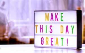 Home Motivatie poster met tekst 'make the day great' ter ondersteuning van zelfverzekerder door het leven gaan